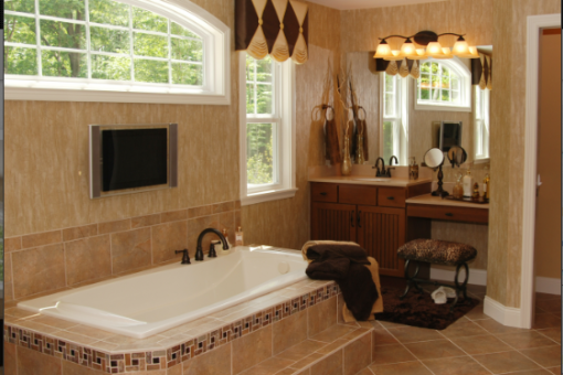 Grand format ou mosaïque : comment le choix du carrelage transforme les petites salles de bain ?